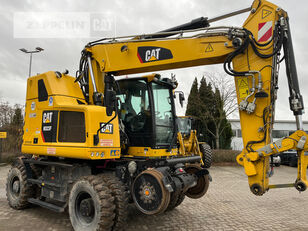 Caterpillar M323F rail excavator