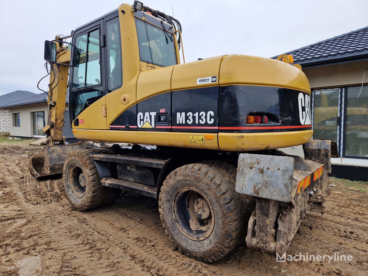 Caterpillar M313C wheel excavator