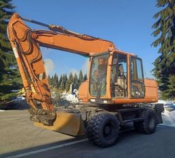 Caterpillar M316C wheel excavator