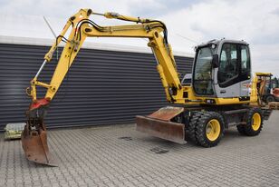 NEW HOLLAND MH 2.6 wheel excavator