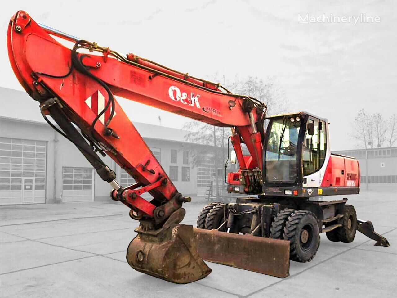 O&K GmbH MH 8.6 wheel excavator